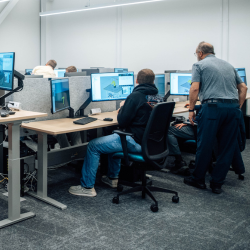 People working on computers in the Digital Foundry computer lab