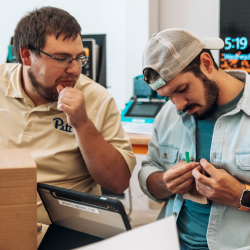 Two young adults working on a project during a Digital Foundry training 